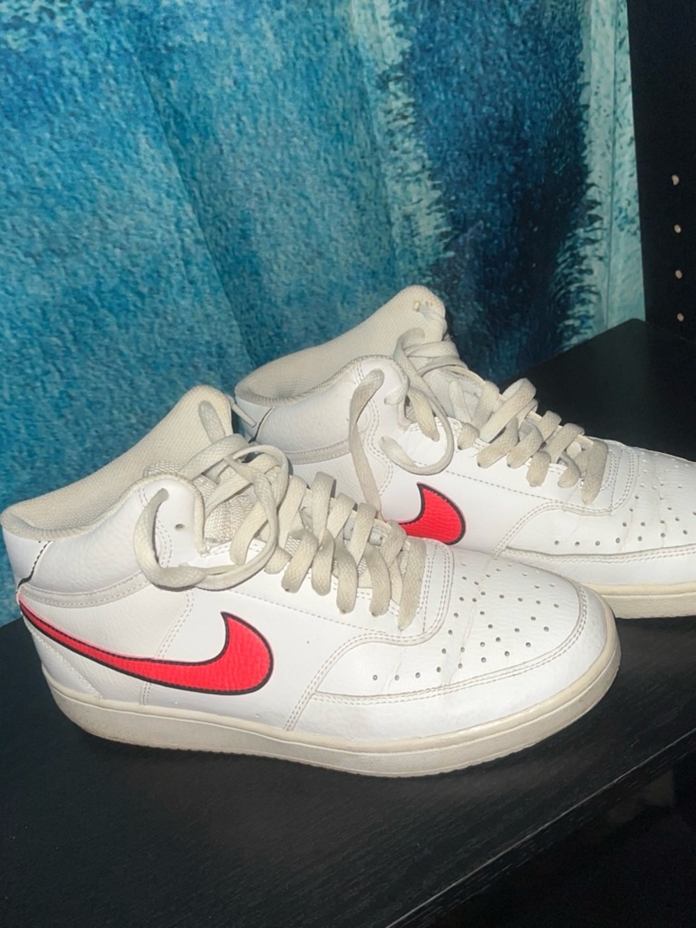 Nike Women’s White Mid-Top Sneakers with Red Swoosh
